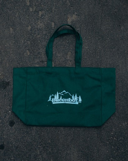 حقيبة تسوق خضراء وزرقاء فاتحة